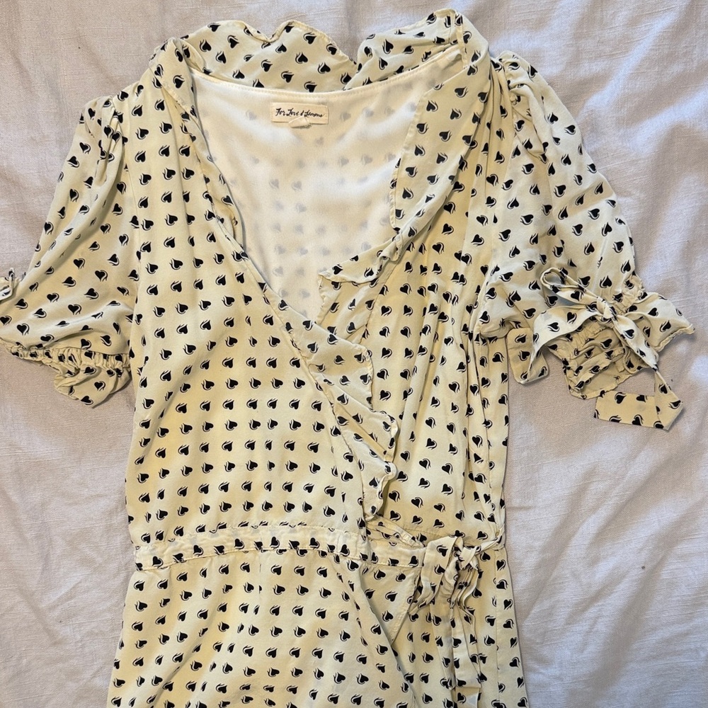 For love and lemons Cream and Black heart Wrap dress